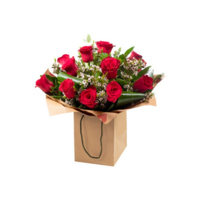 P.s. I Love You - A dozen luxurious red roses, beautifully arranged and delivered in a gift bag or box.